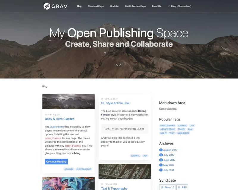 Screenshot of the Grav Open Publishing Space home page on the Quark theme, showing a full-width hero image above a blog listing